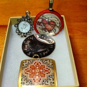 Four beautiful vintage pendants